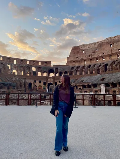 student inside Colloseum in Rome