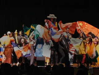 International students displaying the flags of their home countries.