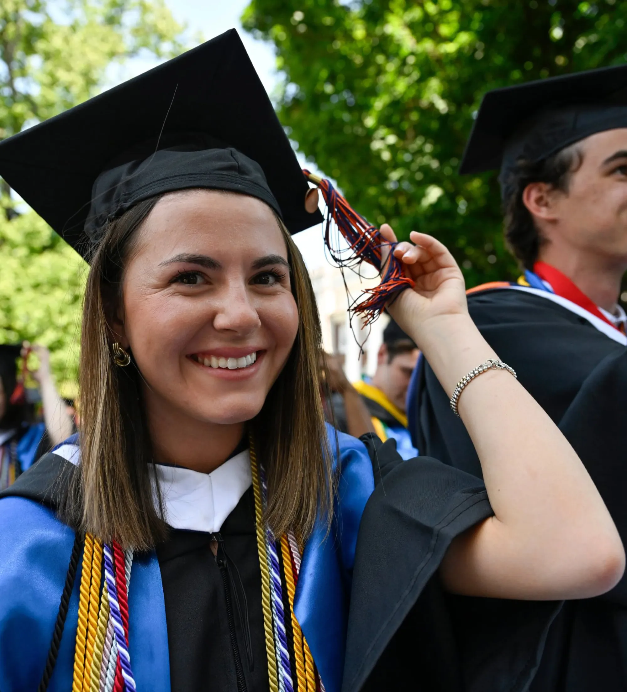 student smiling at Commencement