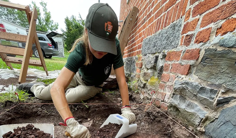 A student in the process of planting