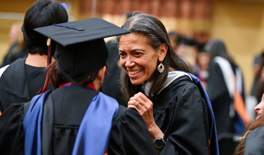 grads talk and smile