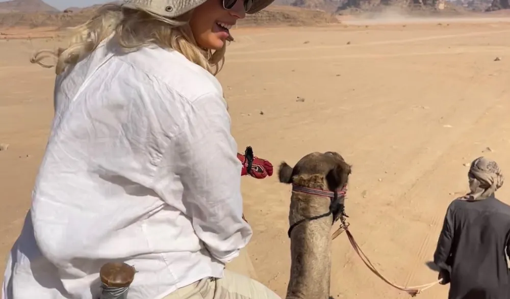 student abroad on camel