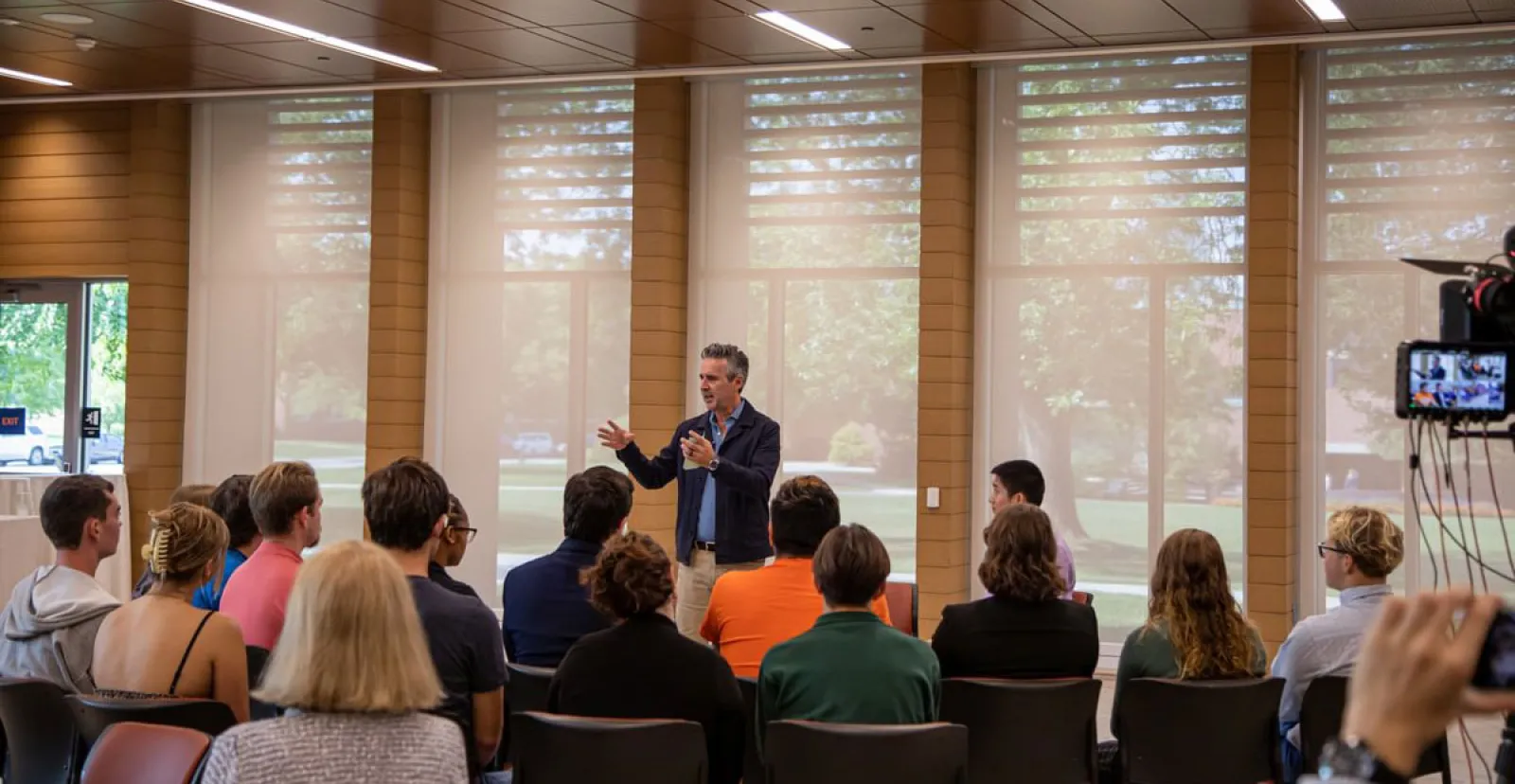 speaker gestures while speaking to attendees