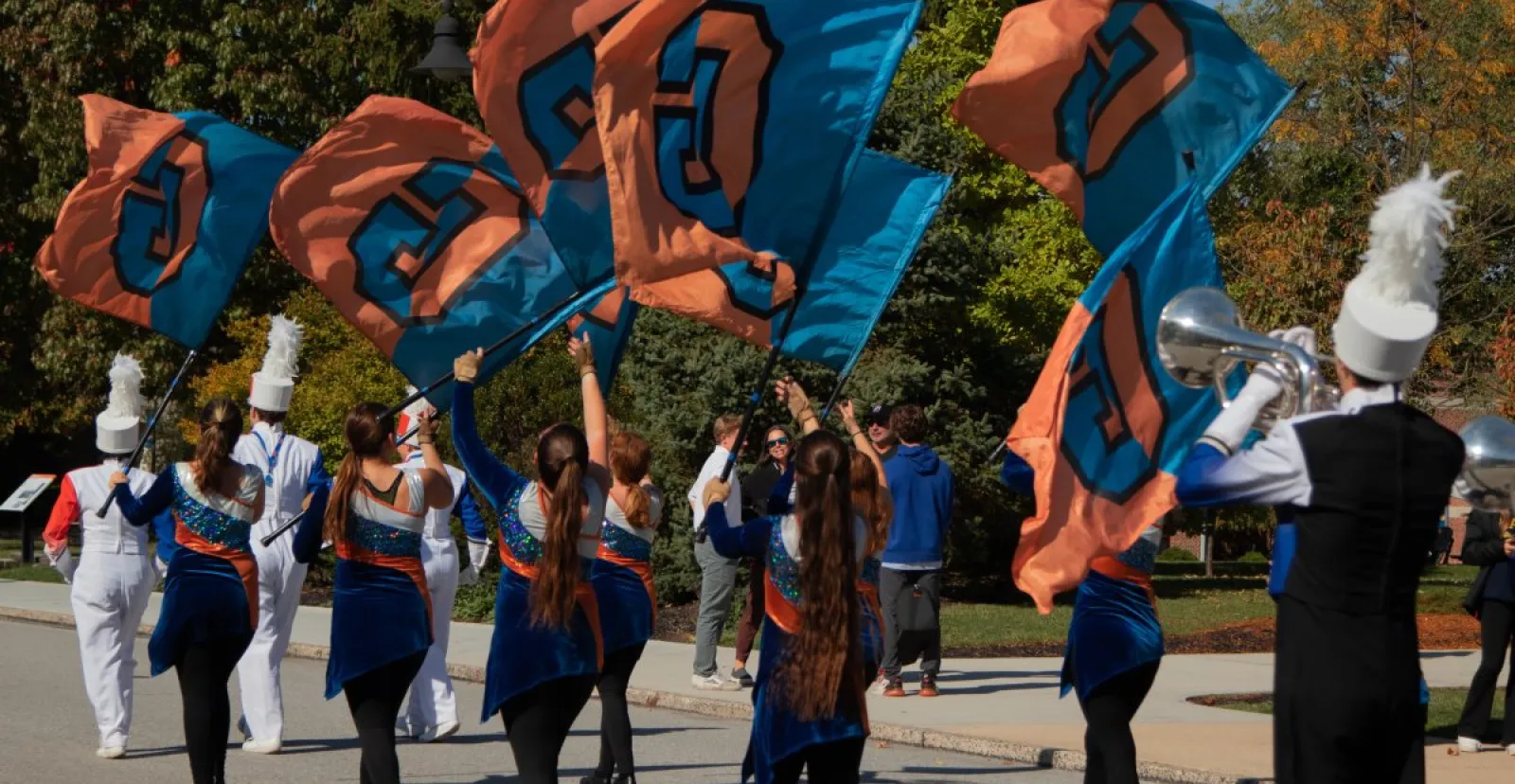 Bullets Marching Band outside in fall parade