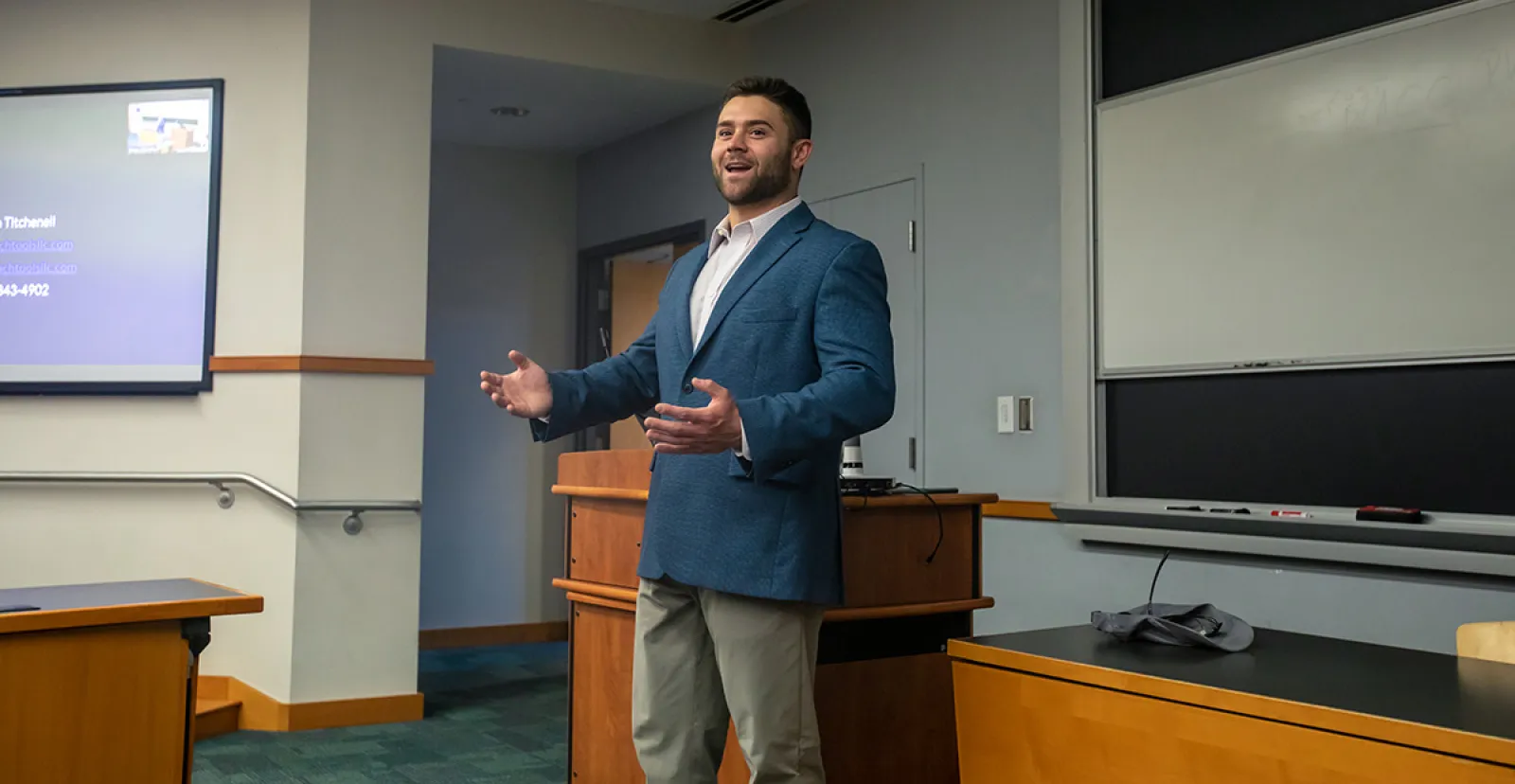 Justin Titchenall speaking to a class