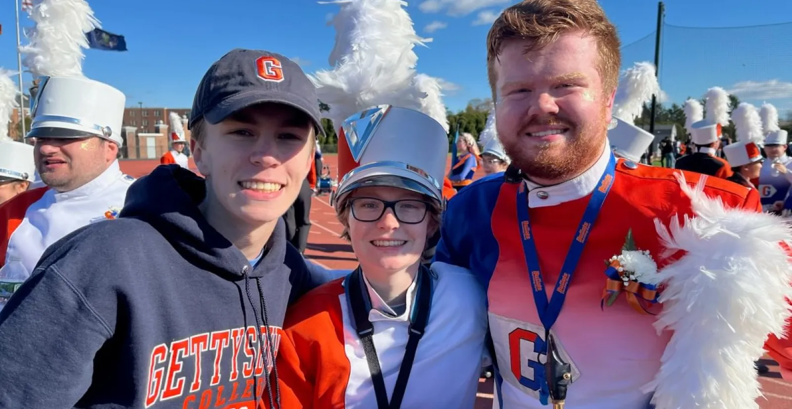 Michael ’25 and Mary ’28 Tropp with their younger sibling, Andrew