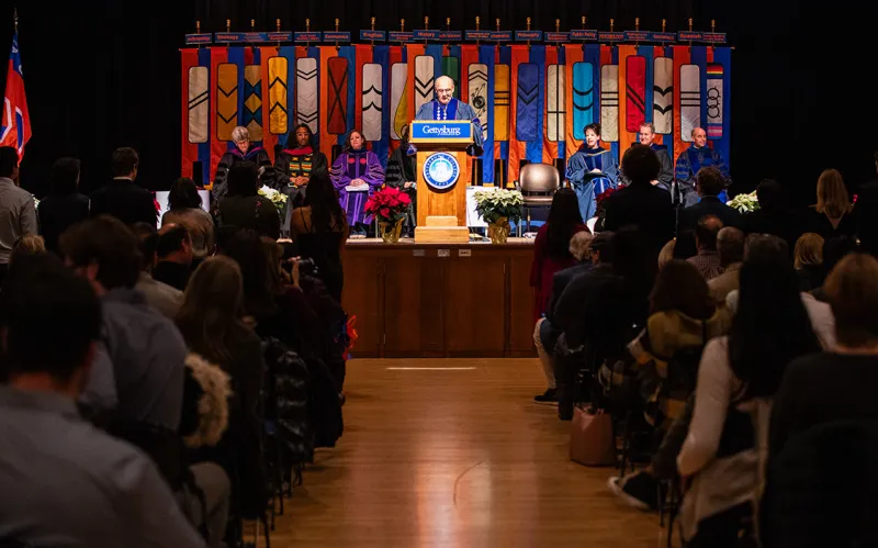President Bob Iuliano speaking at the Midyear Graduation Ceremony