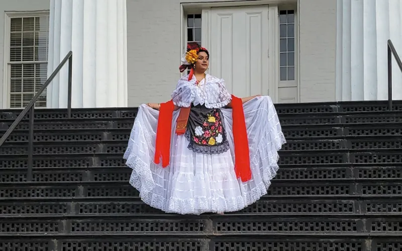 Ivana Lopez Espinosa ’19 stands on the steps of Penn Hall