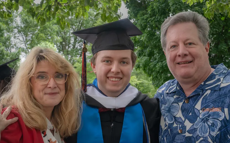 Gabe Houser ’24 with his parents