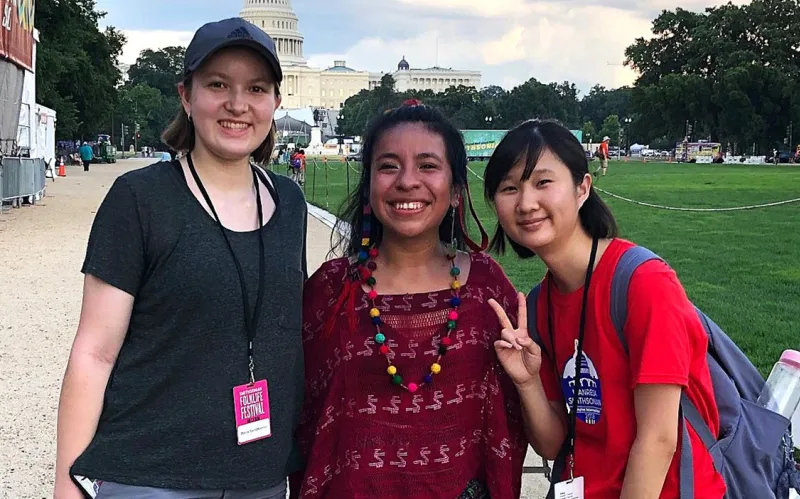 Devon Szczepkowicz ’27 (left) with Maya musician Sara Curruchich and a fellow intern 