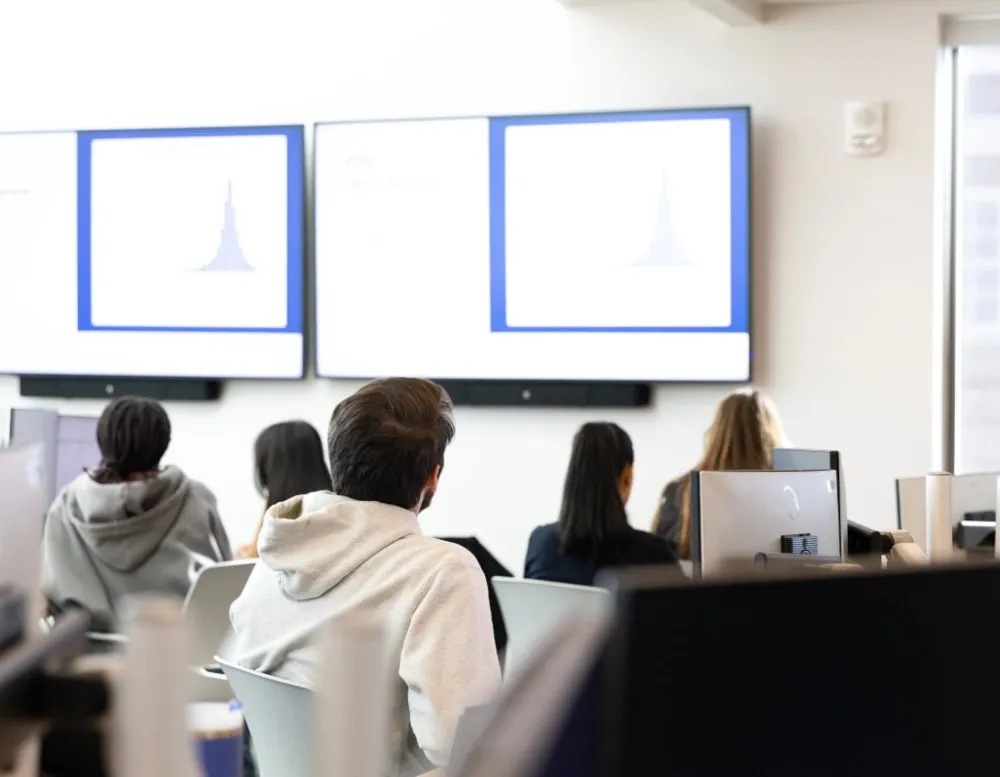 Students viewing graphs